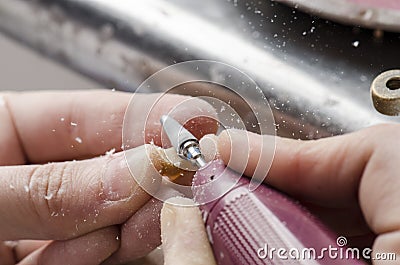 Dental technician doing partial dentures of acrylic resins. Stock Photo