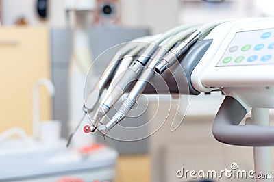 Dental tools on dentist chair with medical equipment Stock Photo