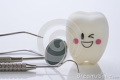 Dental tools and smile teeth model. Stock Photo