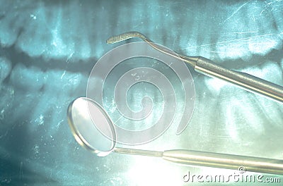 Dental x-ray and dental mirror Stock Photo