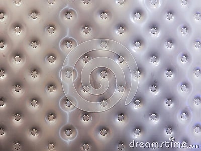 Dented stainless steel surface of a vessel Stock Photo