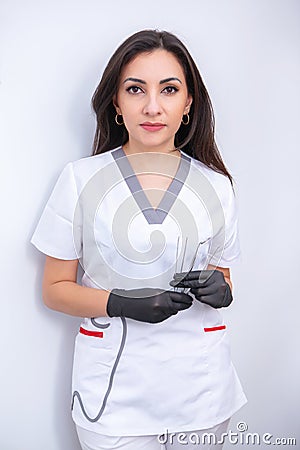Dentist examining patient teeth in dental clinic. Dentistry and healthcare. Stock Photo
