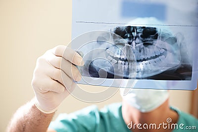 Dentist Examining X-Ray Stock Photo