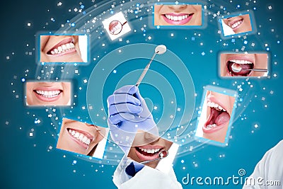 Dentist hand with mirror and perfect smiles Stock Photo