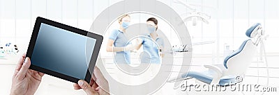 Dentist hand touch digital tablet screen on dental clinic with d Stock Photo