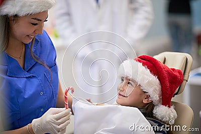 Dentist and her cute patient Stock Photo