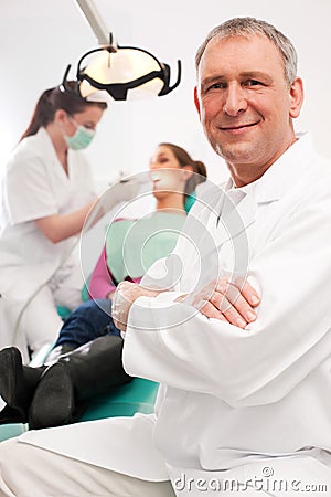 Dentist in his surgery Stock Photo