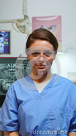 Dentist nurse talking with remote patients about oral hygiene Stock Photo