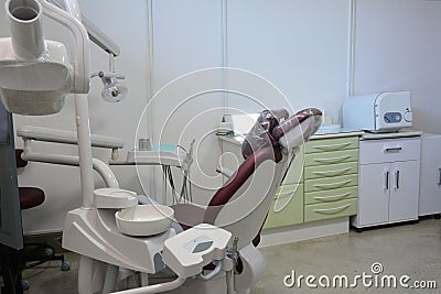 Dentist office, with medical equipment, cabinets, negatoscope with white walls, Brazil, South America and autoclave Stock Photo
