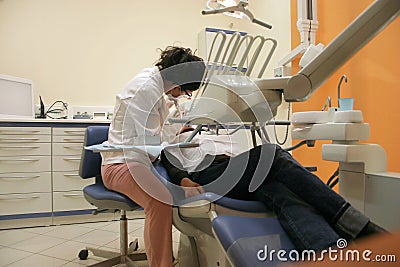 Dentist with patient Stock Photo