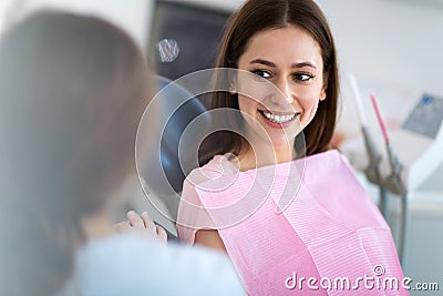 Dentist and patient in dentist office Stock Photo