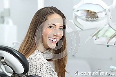 Dentist patient showing perfect smile after treatment Stock Photo