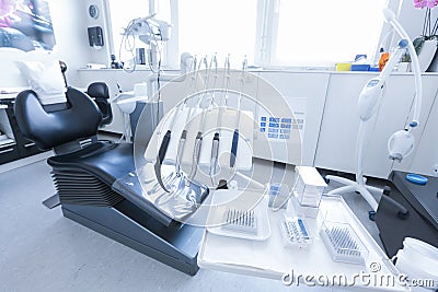 Dentist's chair with tools and drills Stock Photo