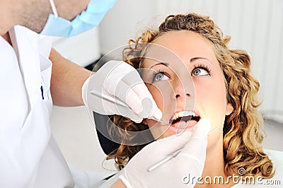 Dentist's teeth checkup Stock Photo