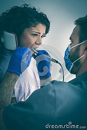 Dentist surgery is so much full of pain. Stock Photo