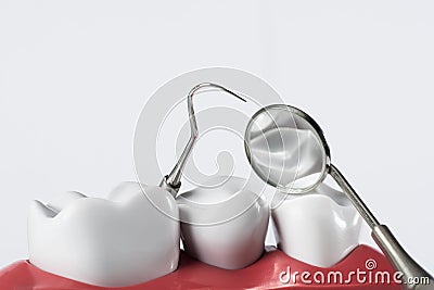 Dentist tools and denture teeth Stock Photo