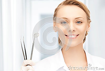 Dentist with tools Stock Photo