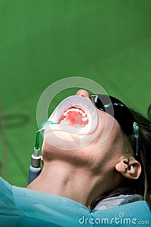 Dentist treat a female patient in dentistry. Treatment concept Stock Photo