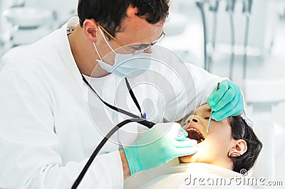 Dentist working Stock Photo