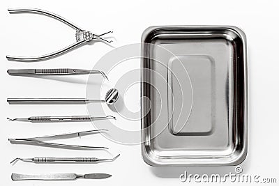 Dentistry with dentist tools close up on white background top view Stock Photo