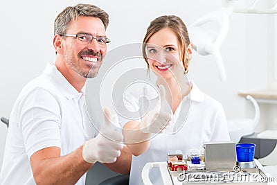 Dentists in their surgery or office with dental tools Stock Photo