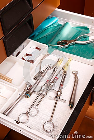 Dentists tools in drawer for novicane Stock Photo