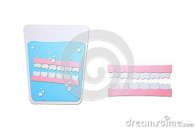 Denture in glass, false teeth for adult Stock Photo