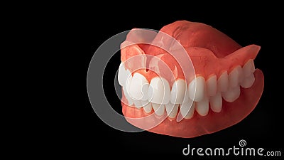 dentures. Isolate on white background acrylic prosthesis of human jaws. The concept of orthopedic dentistry Stock Photo