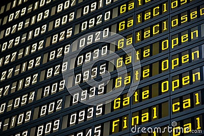 Departure board in airport Stock Photo