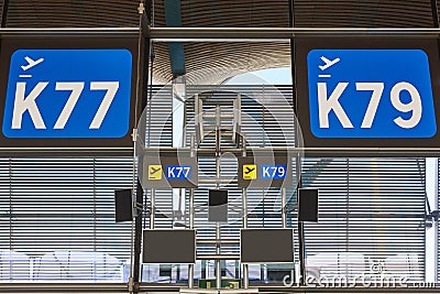 Departure gate information signal at airport terminal. Travel ba Stock Photo