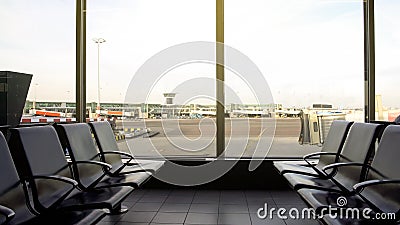 Departure lounge with empty seats, airport terminal, modern transport building Stock Photo