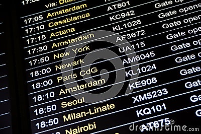 Departures flight information schedule in international airport Editorial Stock Photo