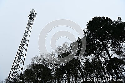 Deployment of the 5G network. Laying antennas on a mobile phone mast in the winter atmosphere. France, Gironde, February Stock Photo