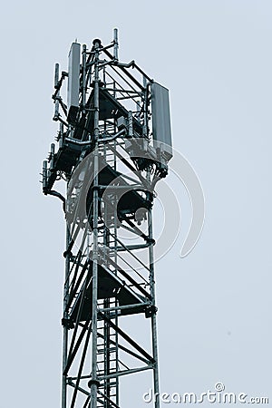 Deployment of the 5G network. Laying antennas on a mobile phone mast in the winter atmosphere. France, Gironde, February Stock Photo