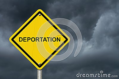 Deportation Warning Sign with a stormy sky Stock Photo