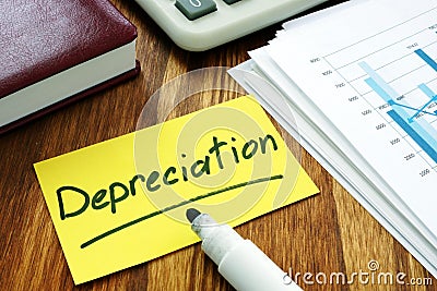 Depreciation concept. Stack of business papers Stock Photo