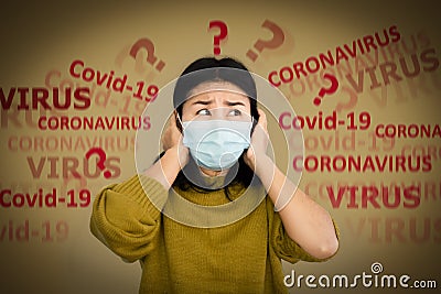 Depressed Asian woman with protective mask scared of covid-19 virus having panic and worry to get sick Stock Photo