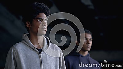 Depressed black young men thinking of problem, emotional and physical abuse Stock Photo