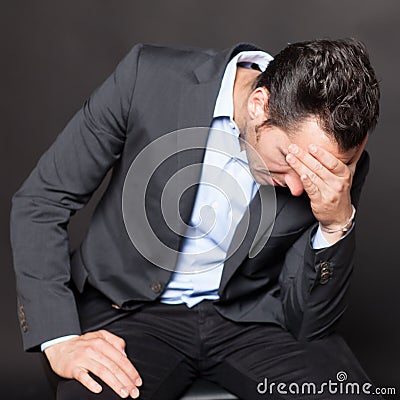 Depressed businessman Stock Photo