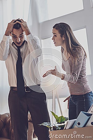 Depressed cheerless woman being angry with her husband Stock Photo