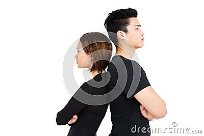 Depressed couple standing back to back Stock Photo