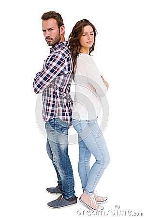 Depressed couple standing back to back Stock Photo