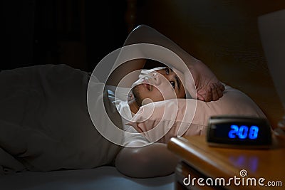 Depressed man suffering from insomnia Stock Photo