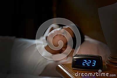 Depressed man suffering from insomnia Stock Photo