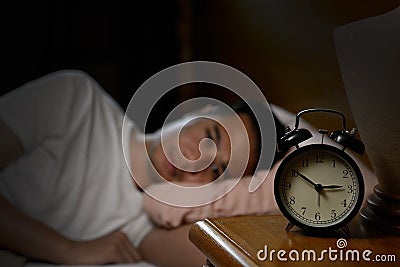 Depressed man suffering from insomnia Stock Photo