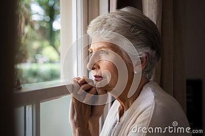 Lonely senior woman Stock Photo