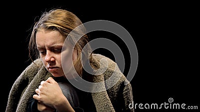 Depressed woman suffering drug withdrawal symptoms, miserable life, addiction Stock Photo