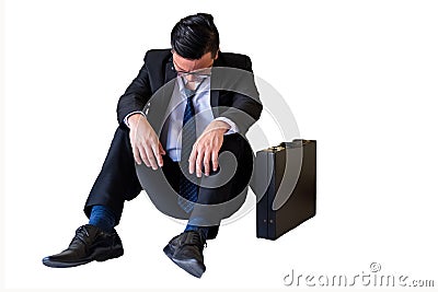 Depressed young Asian businessman isolated on white Stock Photo