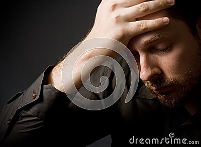 Depressed young business man Stock Photo