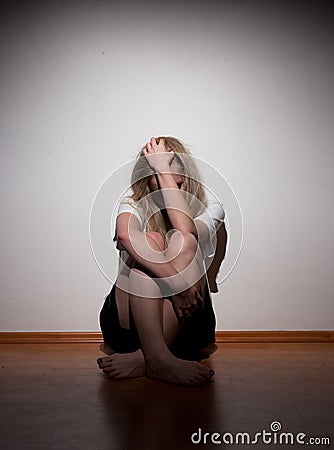 Depressed young lonely woman Stock Photo